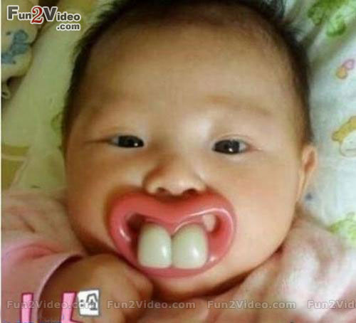 Funny Baby With Long Teeth Image