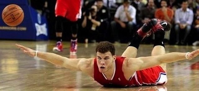 Funny Basketball Player Sliding On Floor