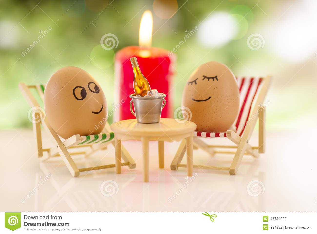 Funny Eggs On A Beach Chair Relaxing With Champagene Bottle