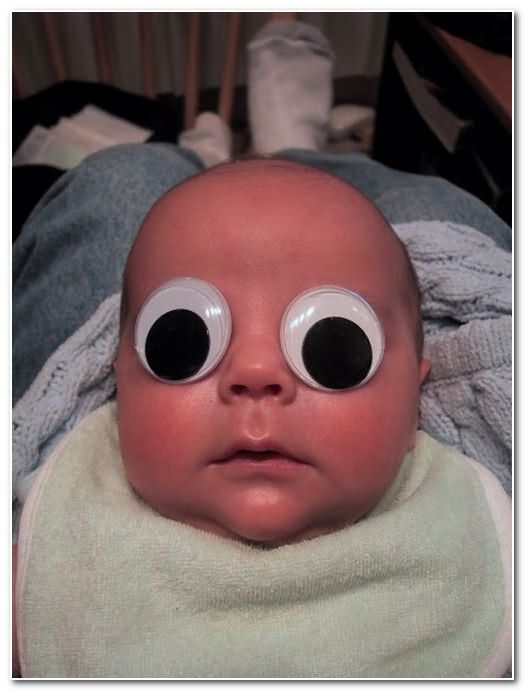 Funny Kid With Big Eyes Picture