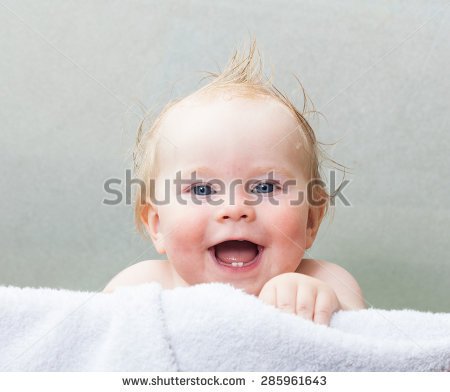 Funny Laughing Baby Looks Out Of The Crib
