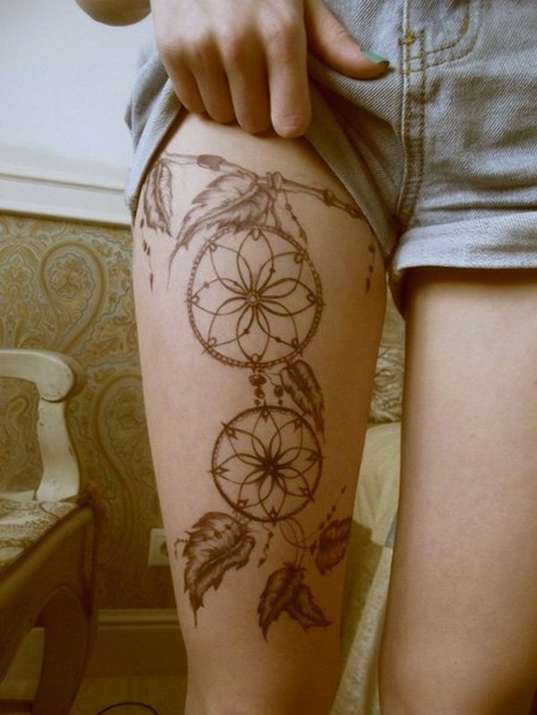 Girl Showing Her Dreamcatcher Tattoo On Leg