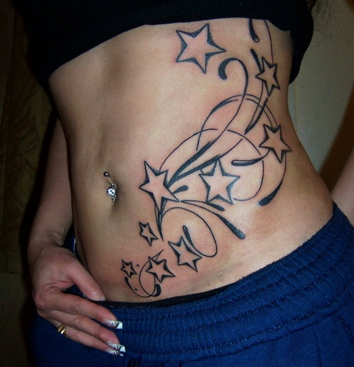 Girl With Outline Star Tattoos On Side Rib