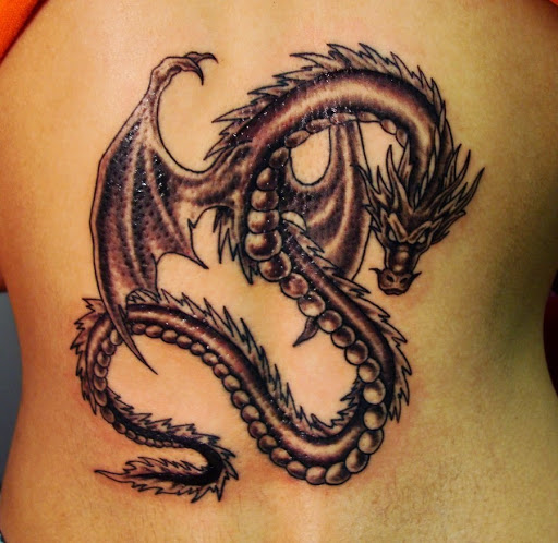 Grey And Black Dragon Tattoo On Back