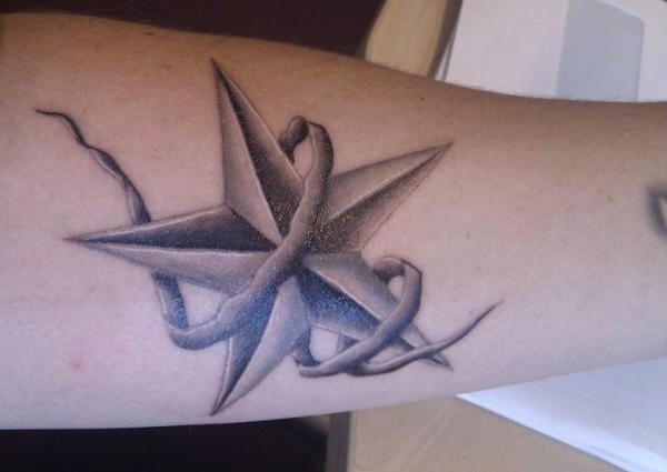 Grey And Black Nautical Star Tattoo On Leg