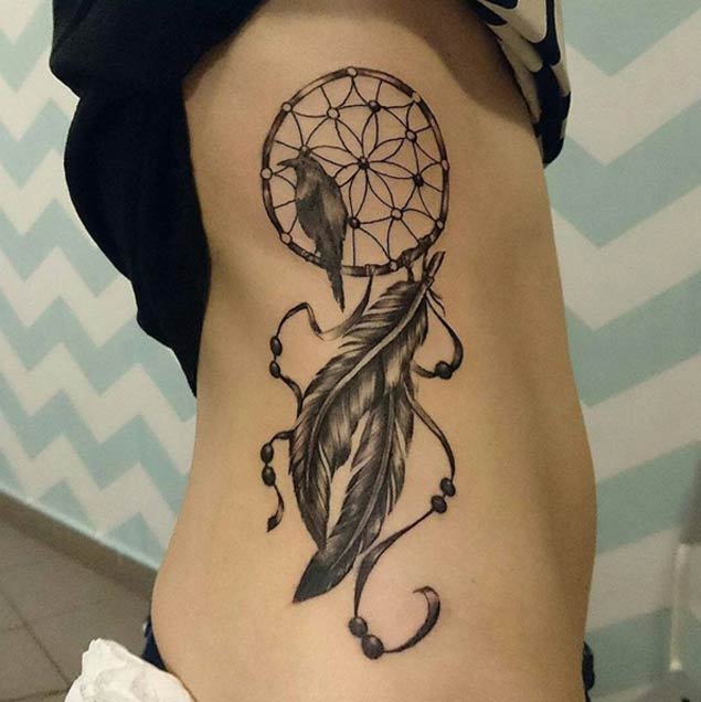 Grey Crow And Dreamcatcher Tattoo On Side Rib
