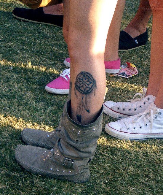 Grey Dreamcatcher Tattoo On Girl Side Leg