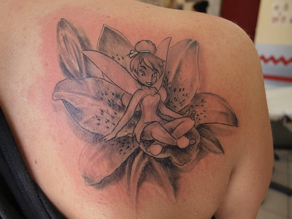 Grey Ink Fairy On Flower Tattoo On Right Back Shoulder