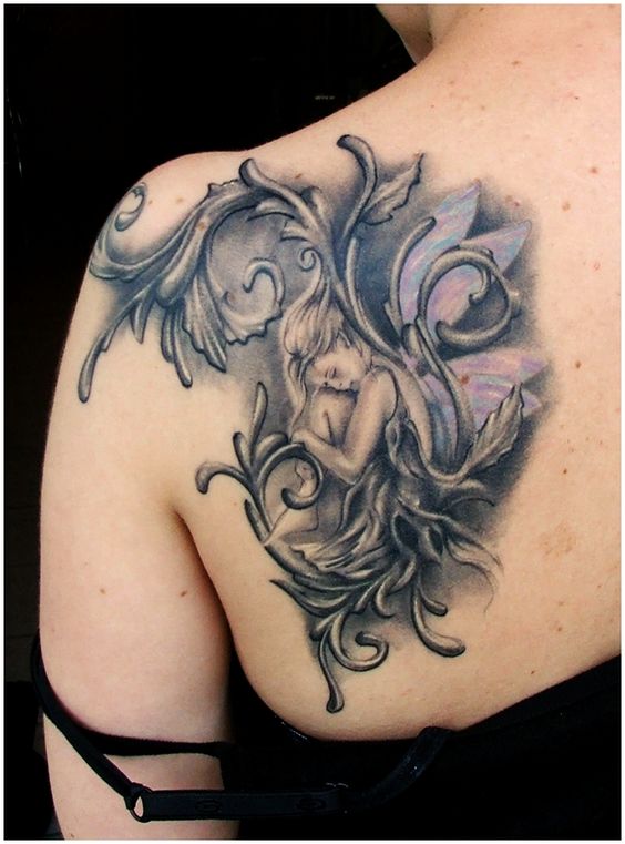 Grey Ink Fairy Tattoo On Girl Left Back Shoulder