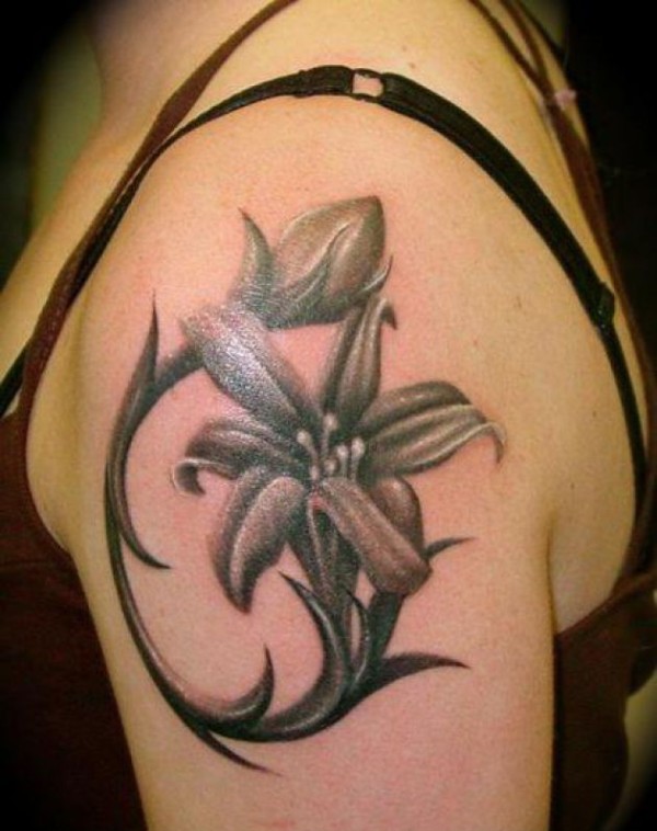 Grey Ink Lily Flower Tattoo On Left Shoulder