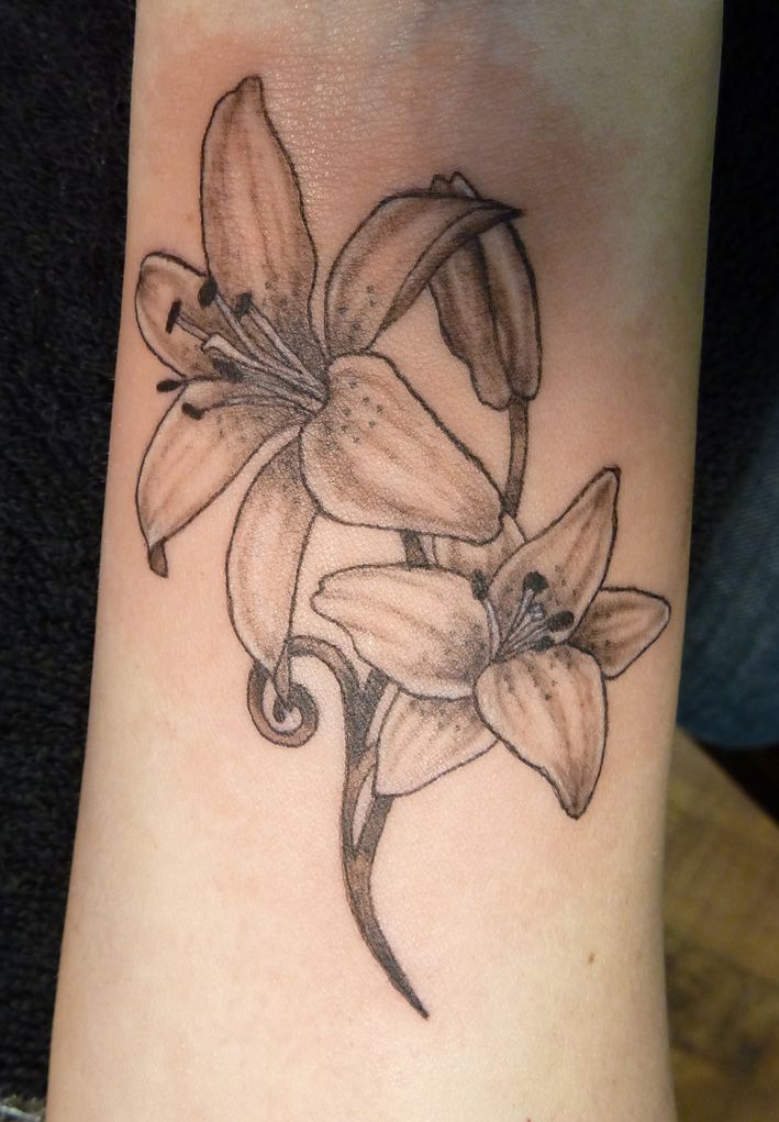 Grey Ink Lily Flowers Tattoo Design For Wrist