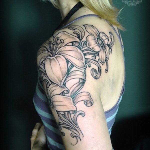 Grey Ink Lily Flowers Tattoo On Girl Left Shoulder