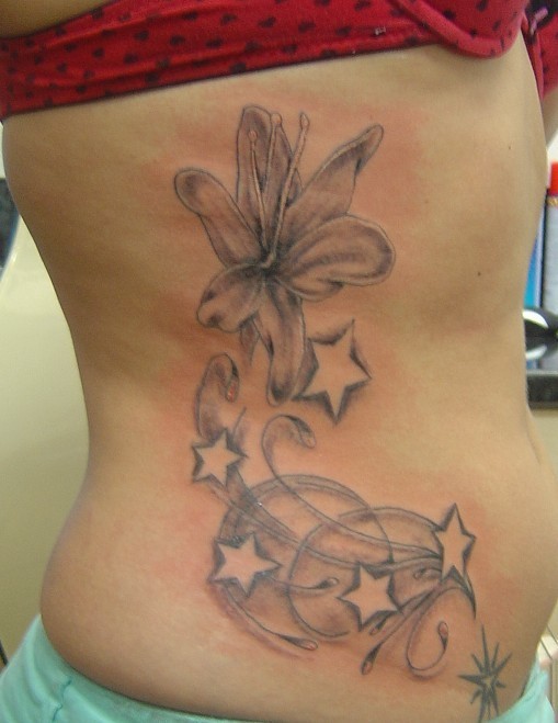 Grey Lily Flower And Stars Tattoo On Side Rib