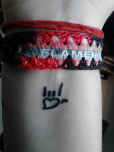 I Love You Symbol Tattoo On Girl Wrist