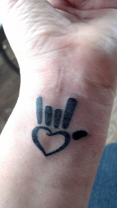 I Love You Symbol Tattoo On Left Wrist