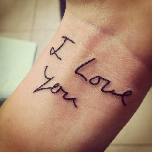 I Love You Tattoo On Left Wrist With Black Ink