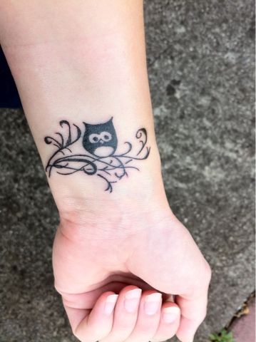 Inspiring Black Ink Owl Tattoo On Left Wrist