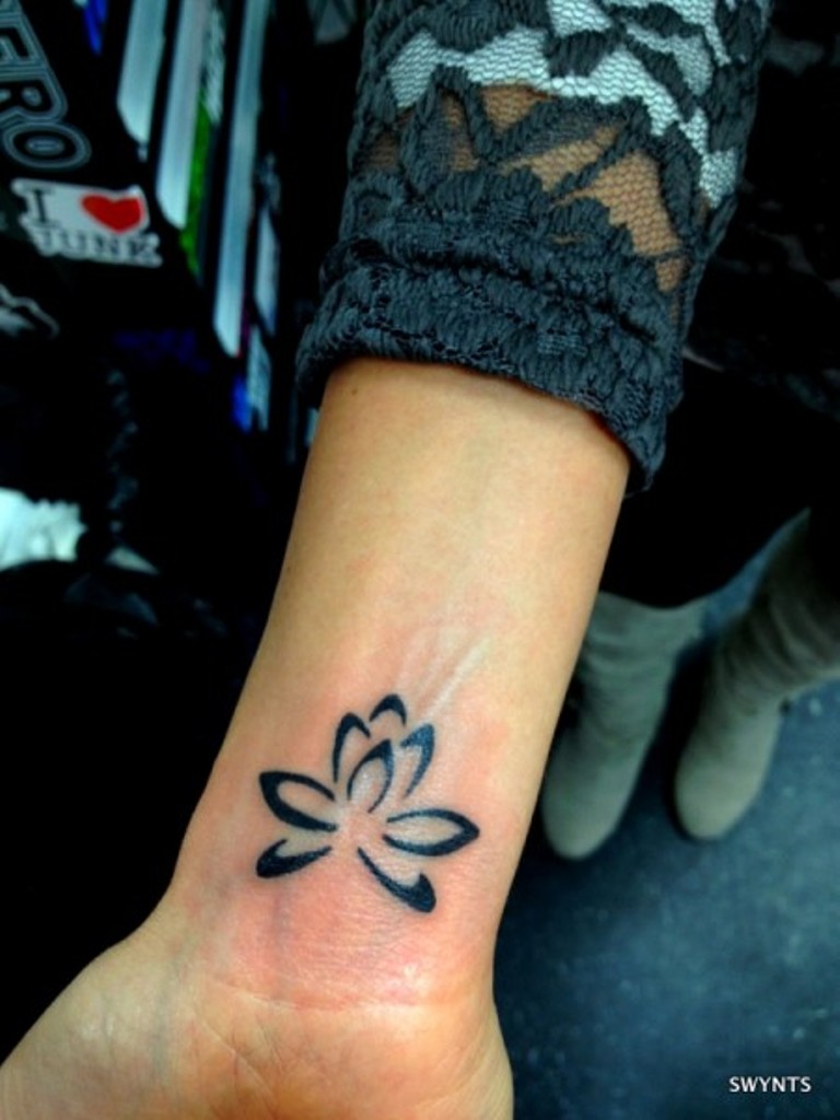 Inspiring Black Outline Lotus Tattoo On Right Wrist