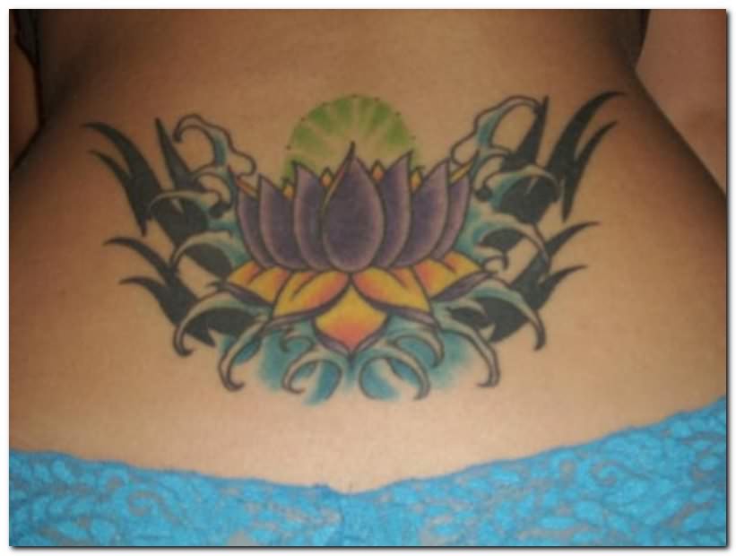 Inspiring Lotus Flower Tattoo On Female Lower Back