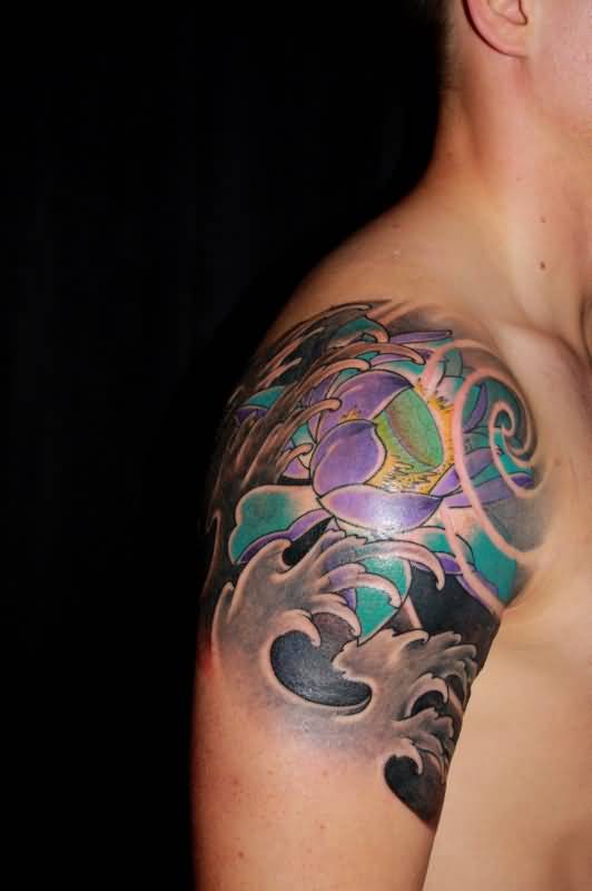Japanese Colorful Lotus Flower Tattoo On Man Right Shoulder