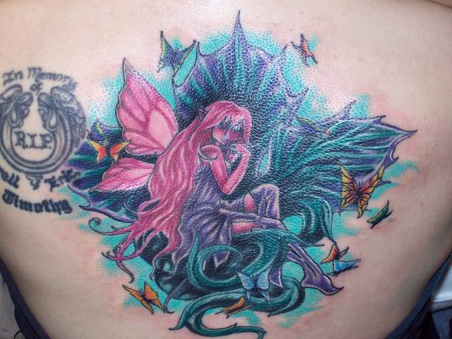 Latest Colorful Fairy With Flying Butterflies Tattoo On Upper Back