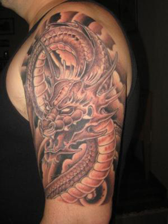 Left Half Sleeve Dragon Tattoo