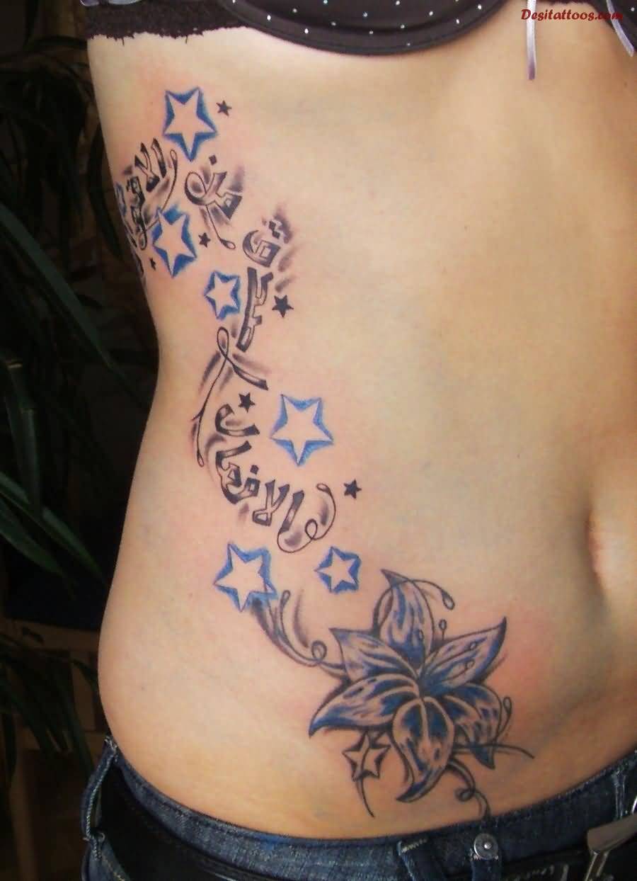 Lilies And Stars Tattoos On Right Hip