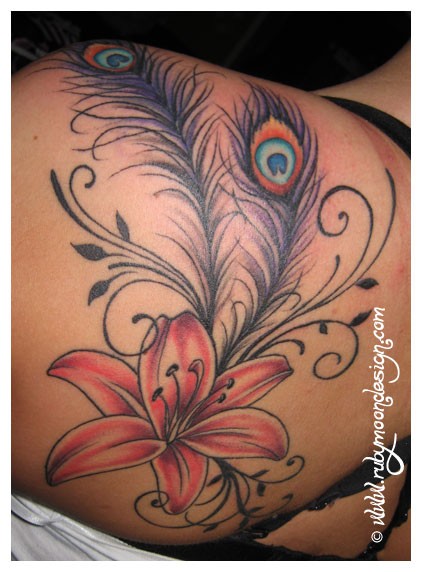 Lily Flower With Peacock Feathers Tattoo On Girl Left Back Shoulder