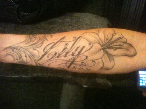 Lily - Grey Ink Lily Flower Tattoo On Right Forearm