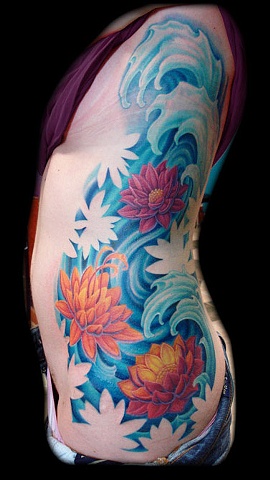 Lotus Flowers In Water Tattoo On Girl Left Side Rib