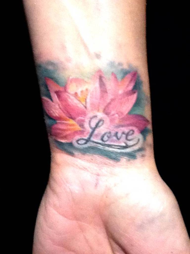 Love – Lily Flower Tattoo On Left Wrist