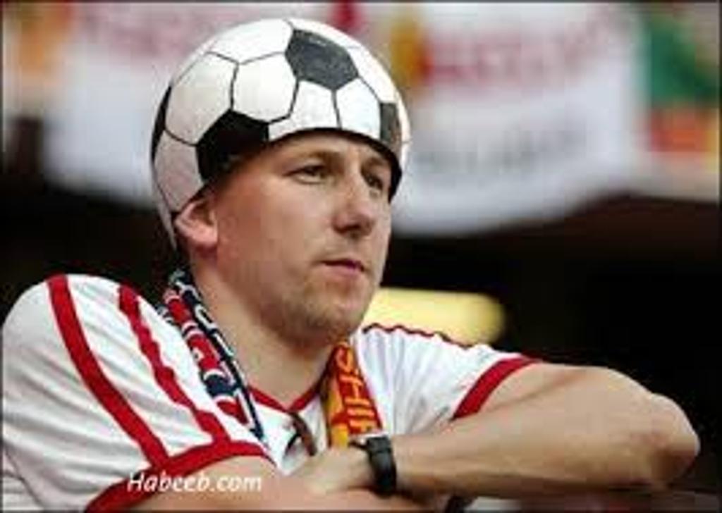 Man Wearing Soccer Helmet Funny Image
