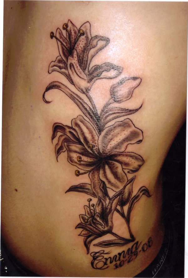 Memorial Black And Grey Lily Tattoo On Rib Side
