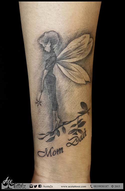 Mom Dad - Grey Ink Fairy Tattoo Design For Forearm