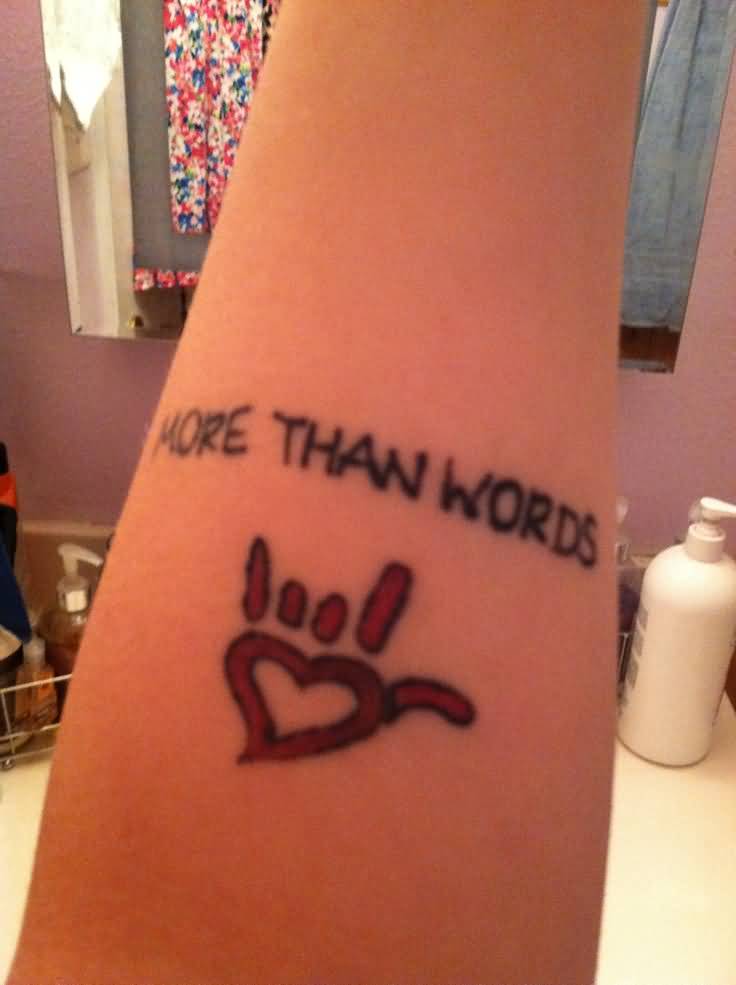 More Than Words I Love You Sign Tattoo On Forearm