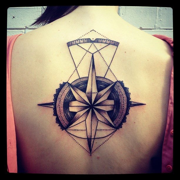 Nautical Star Tattoo On Girl Upper Back