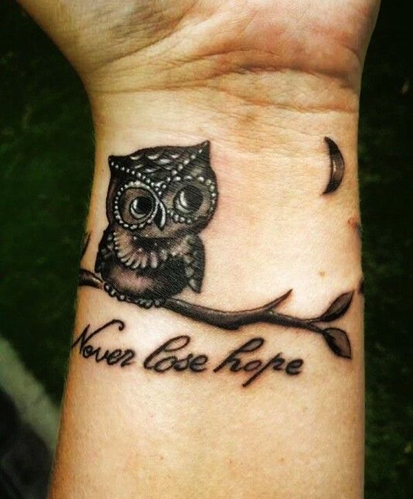 Never Lose Hope – Black Ink Owl On Branch Tattoo On Left Wrist