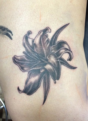 Nice Black And Grey Lily Tattoo Image