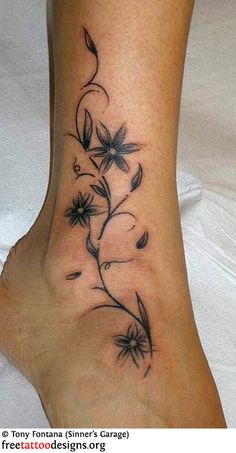 Nice Grey Lily Tattoo On Ankle