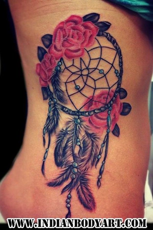 Nice Rose Flowers And Dreamcatcher Tattoo On Rib Side