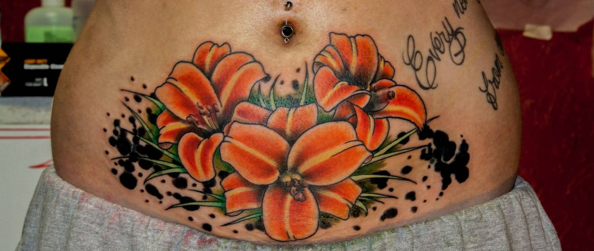 Orange Ink Lily Flowers Cover Up Tattoo On Waist