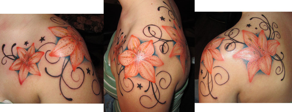Orange Ink Lily Flowers Tattoo On Girl Left Shoulder By Amy
