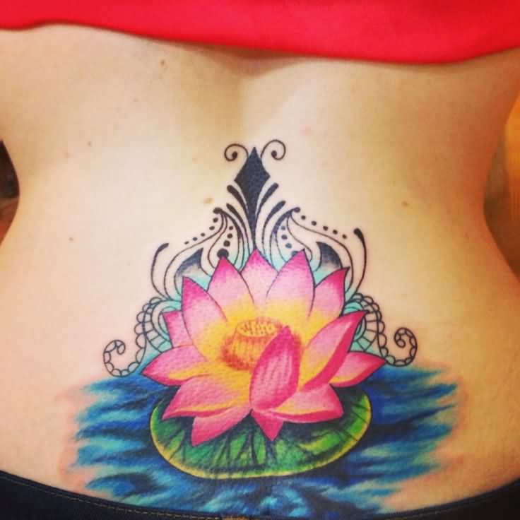 Pink Ink Lotus Flower In Water Tattoo On Girl Lower Back