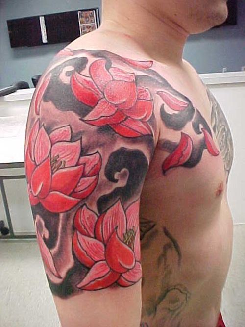 Pink Ink Lotus Flowers Tattoo On Man Right Half Sleeve