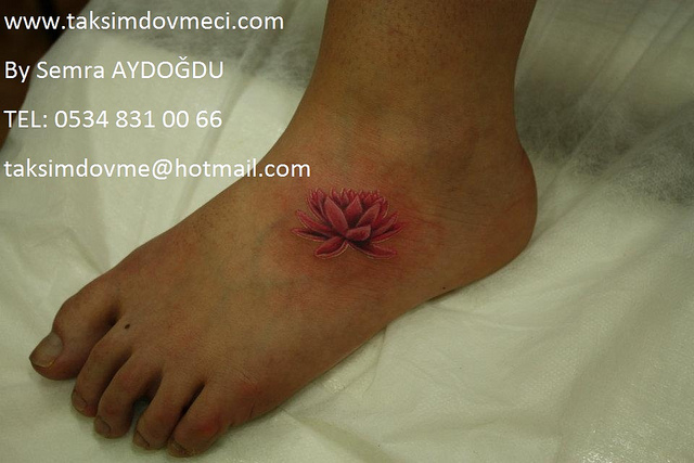 Pink Ink Lotus Tattoo On Left Foot