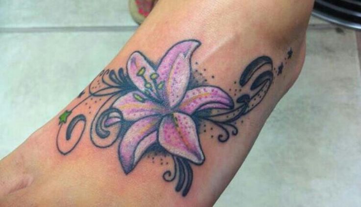 Pink Lily Flower Tattoo On Left Foot