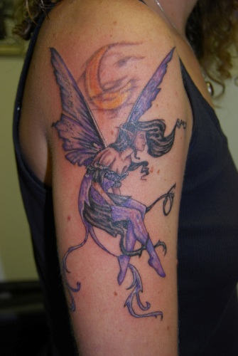 Purple Ink Fairy With Half Moon Tattoo On Women Right Upper Arm