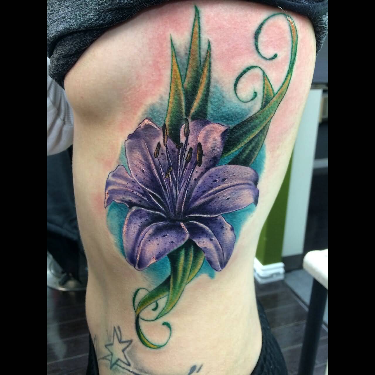 Purple Ink Lily Cover Up Tattoo On Left Side Rib