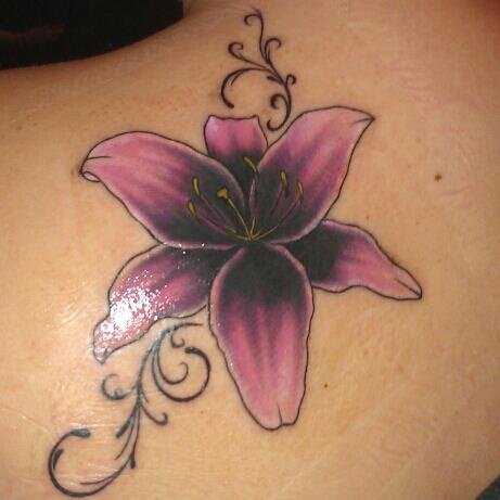 Purple Ink Lily Cover Up Tattoo On Upper Back