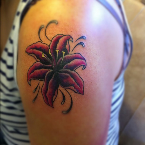 Purple Ink Lily Flower Cover Up Tattoo On Left Shoulder